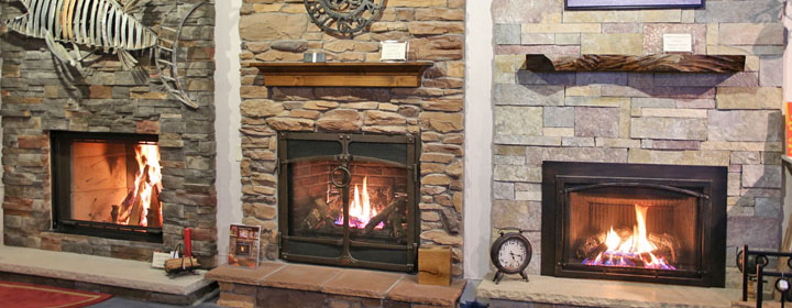beautiful fireplace inserts and wood burning fireplaces in showroom