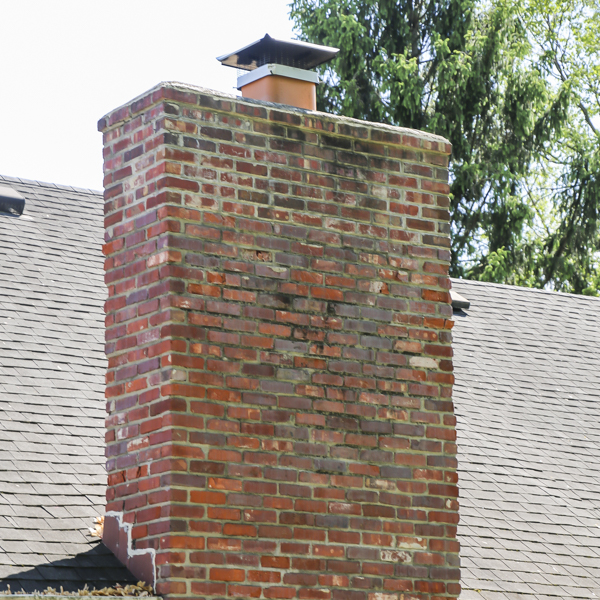 Snow damaged chimney in Union Grove, WI.